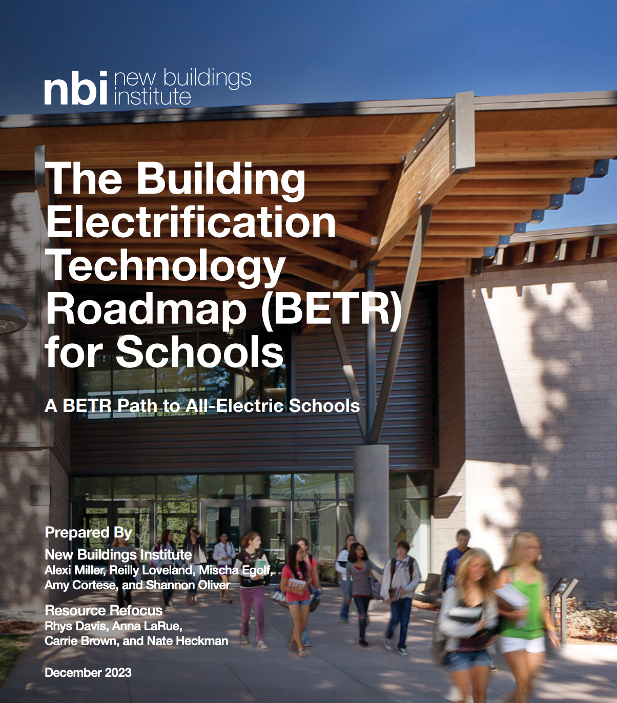 Front of report with title and a school building with students